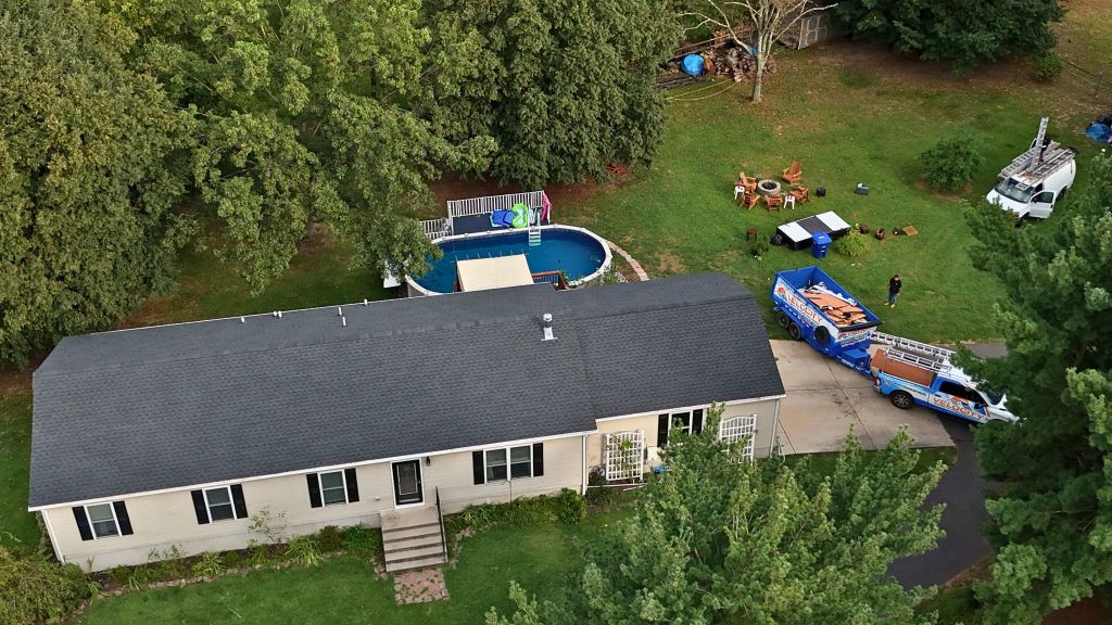 Velocity Roofing truck and crew at a South Jersey roof replacement
